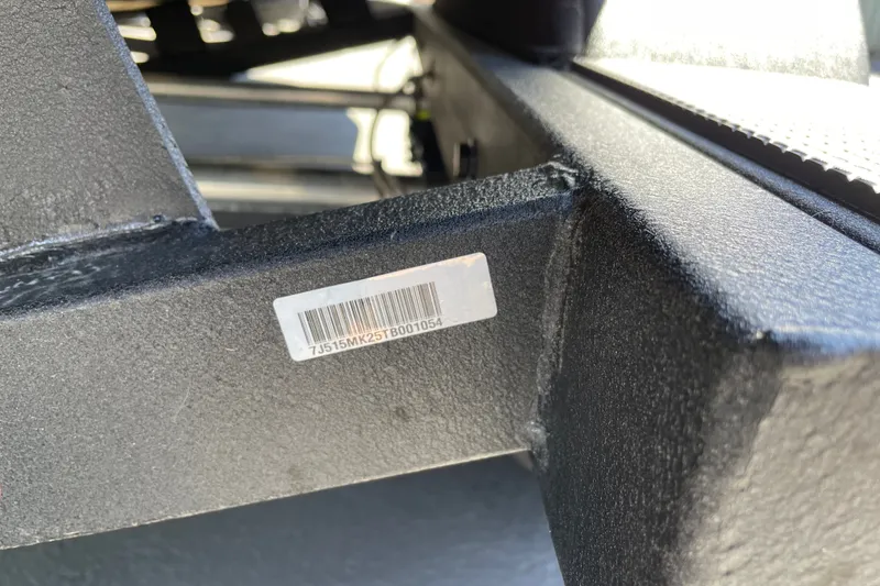 Slide: The Image of Close-up of a barcode on a 2026 Tahoe 1950 vehicle component. - 151