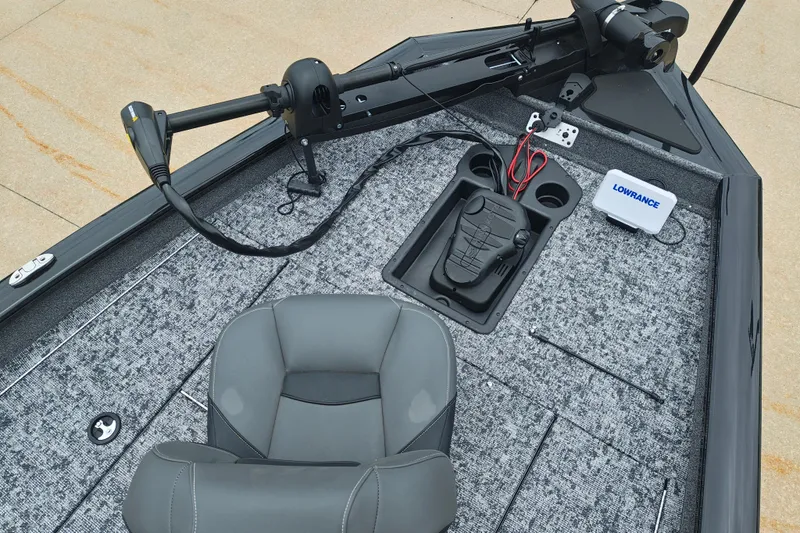 Slide: The Image of Interior of 2026 Tracker Pro Team 175 boat with fishing seat and control panel. - 12