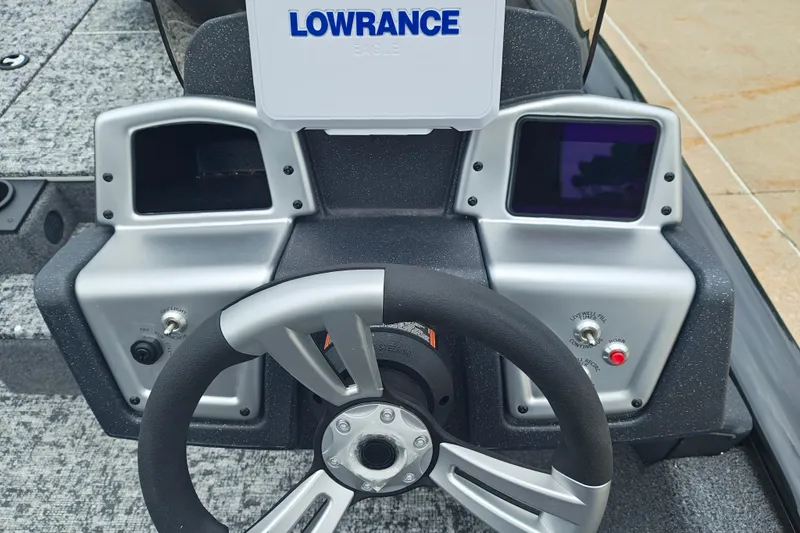 Slide: The Image of Steering console of 2026 Tracker Pro Team 175 boat with Lowrance electronics. - 9
