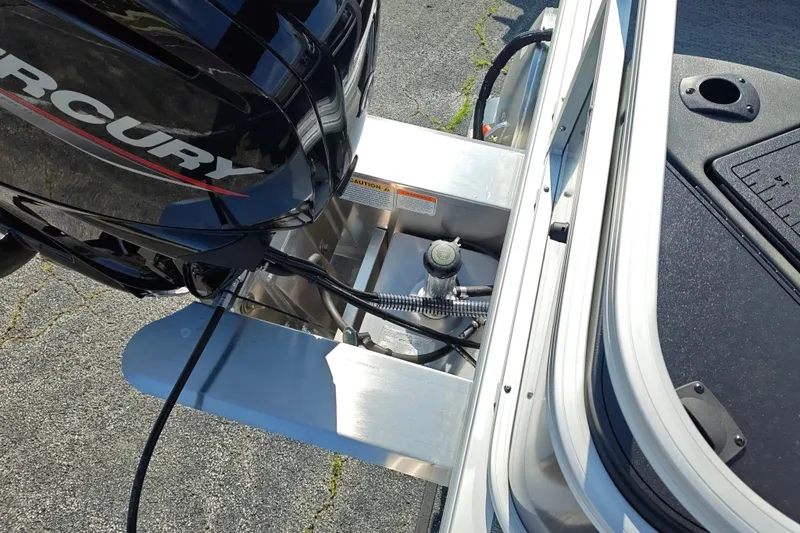 Slide: The Image of 2026 Sun Tracker Bass Buggy 18 DLX with Mercury outboard motor, detailed view. - 20