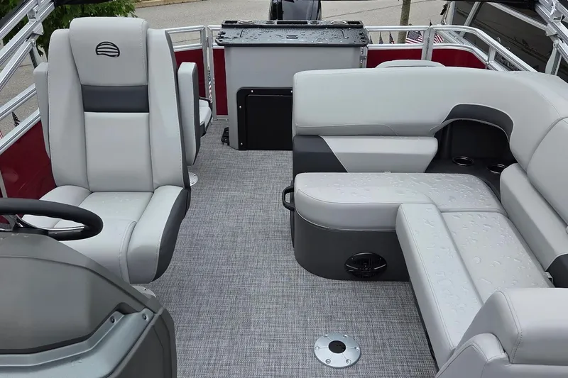 Slide: The Image of 2026 Sun Tracker SportFish 20 DLX interior with gray seating and modern design. - 3