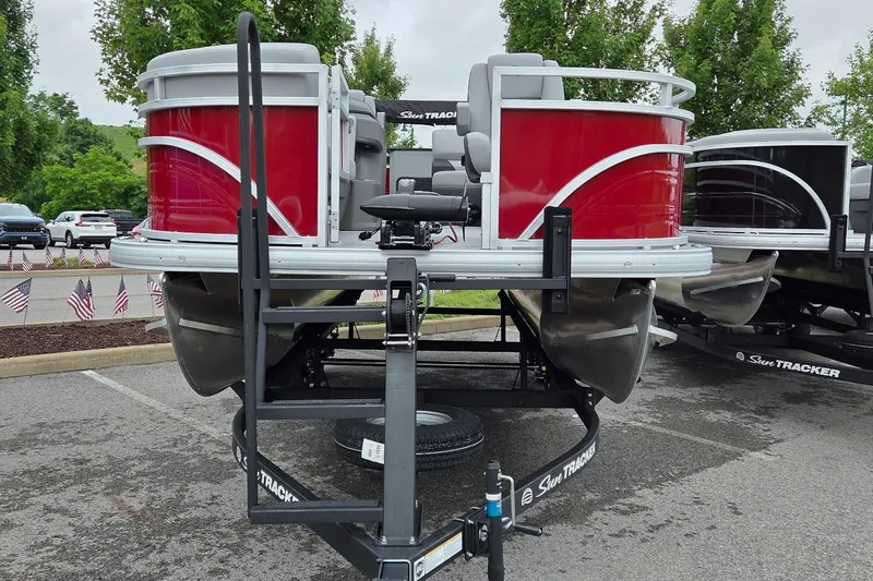 Slide: The Image of 2026 Sun Tracker SportFish 20 DLX pontoon boat with red exterior on display. - 5