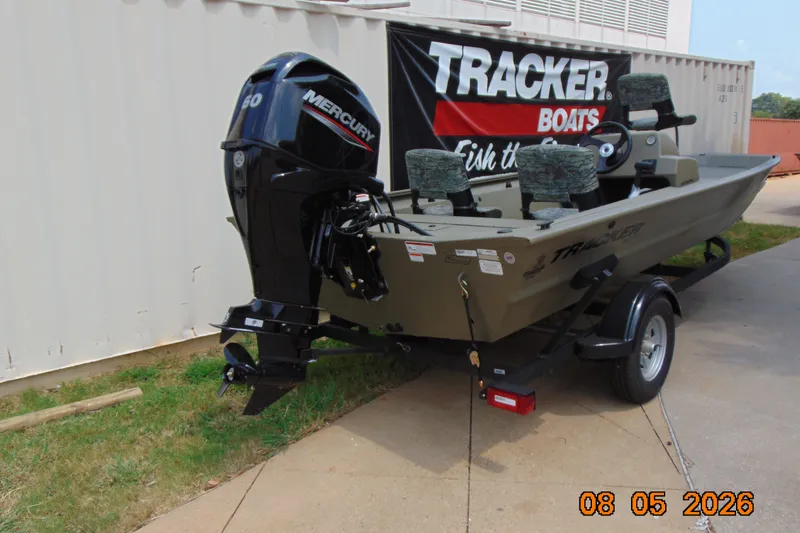 Slide: The Image of 2026 Tracker Grizzly 1754 SC boat with Mercury engine on trailer. - 21