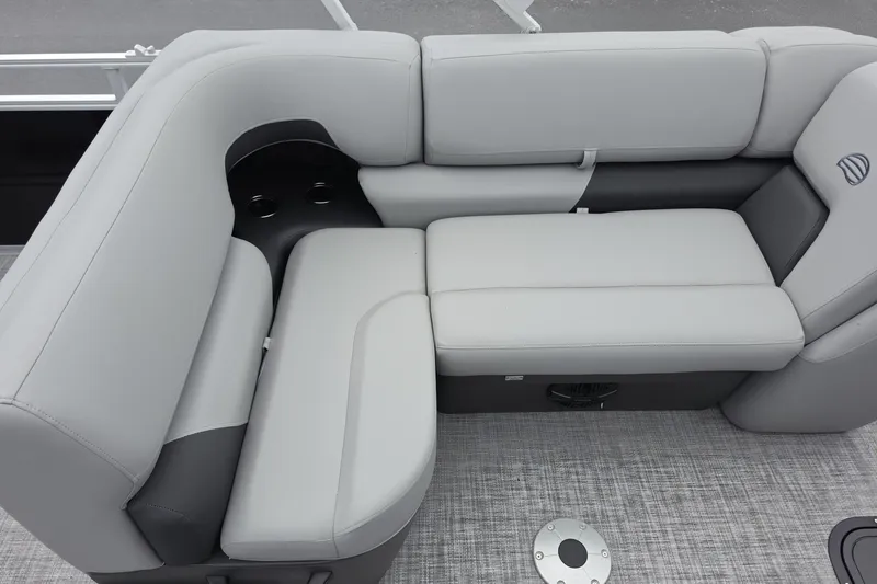Slide: The Image of 2026 Sun Tracker SportFish 22 XP3 boat interior with gray cushioned seating. - 10