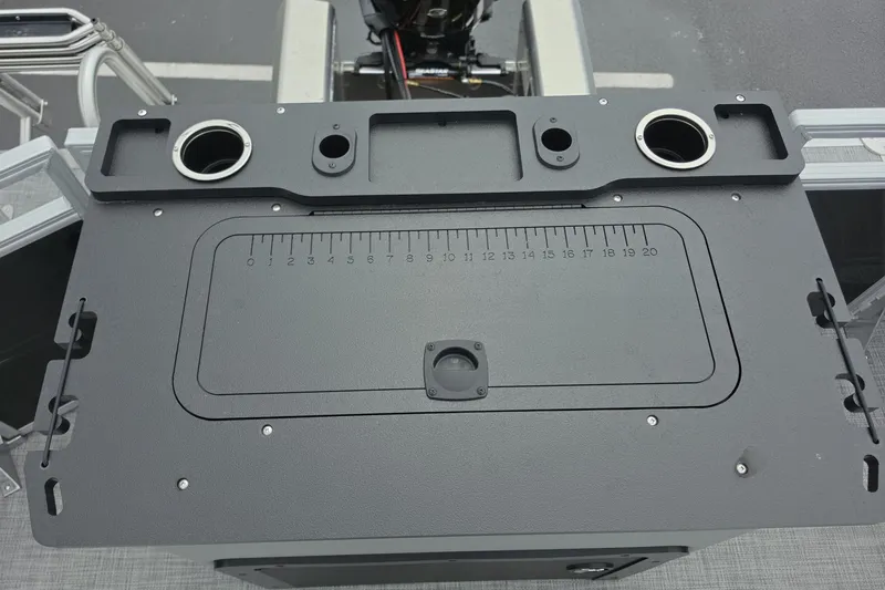 Slide: The Image of 2026 Sun Tracker SportFish 22 XP3 fishing station with integrated measuring board and cup holders. - 14
