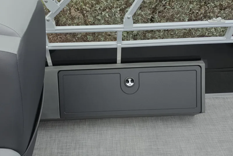 Slide: The Image of 2026 Sun Tracker SportFish 22 XP3 storage compartment with sleek design and secure lock. - 8
