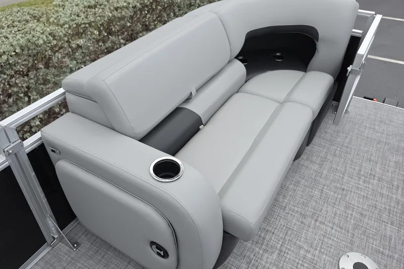 Slide: The Image of Luxurious seating on 2026 Sun Tracker SportFish 22 XP3 pontoon boat, featuring cup holders. - 9