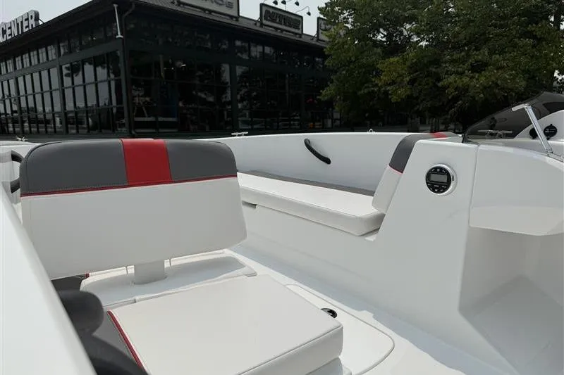 Slide: The Image of 2026 Tahoe T18 boat interior with modern seating and sleek design. - 9