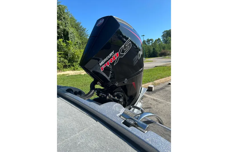 Slide: The Image of 2026 Nitro Z19 XL Pro with Mercury Pro XS 200 outboard engine in a sunny outdoor setting. - 3