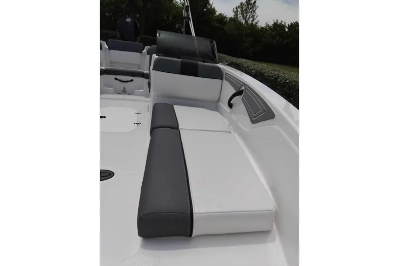 Slide: The Image of 2026 Tahoe T21 boat interior with cushioned seating and sleek design. - 10