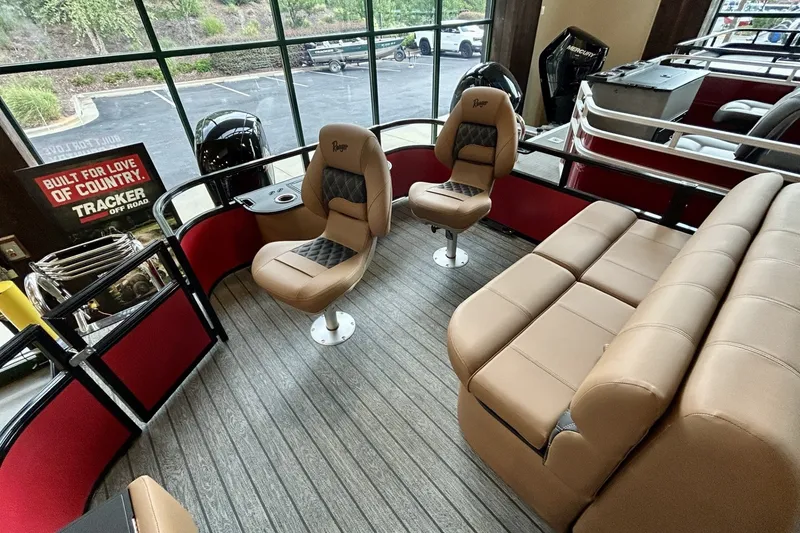 Slide: The Image of Interior of 2026 Ranger 220F boat with tan seating and wood-style flooring. - 3