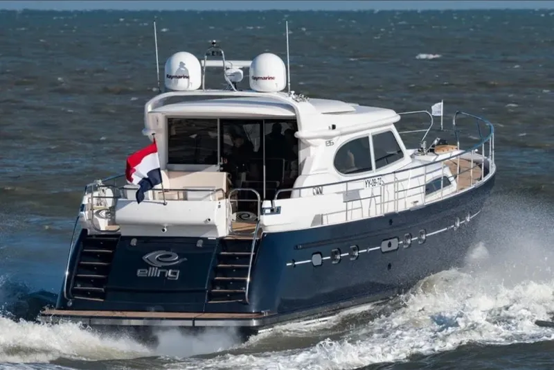 Slide: The Image of Elling E6 yacht 2020 cruising on the sea. - 1