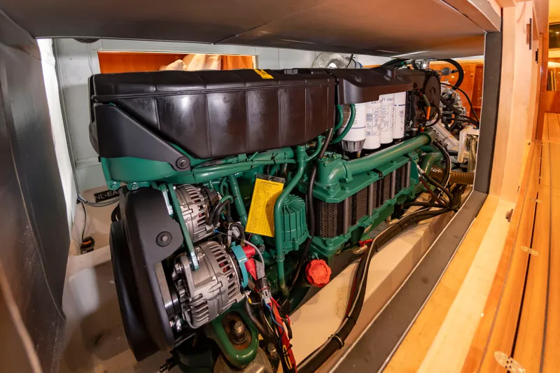 Slide: The Image of Engine room of a 2020 Elling E6 with a green engine and cables. - 33