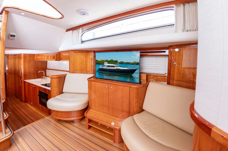 Slide: The Image of Luxurious interior of an Elling E6 yacht with elegant wood accents and comfortable seating. - 29
