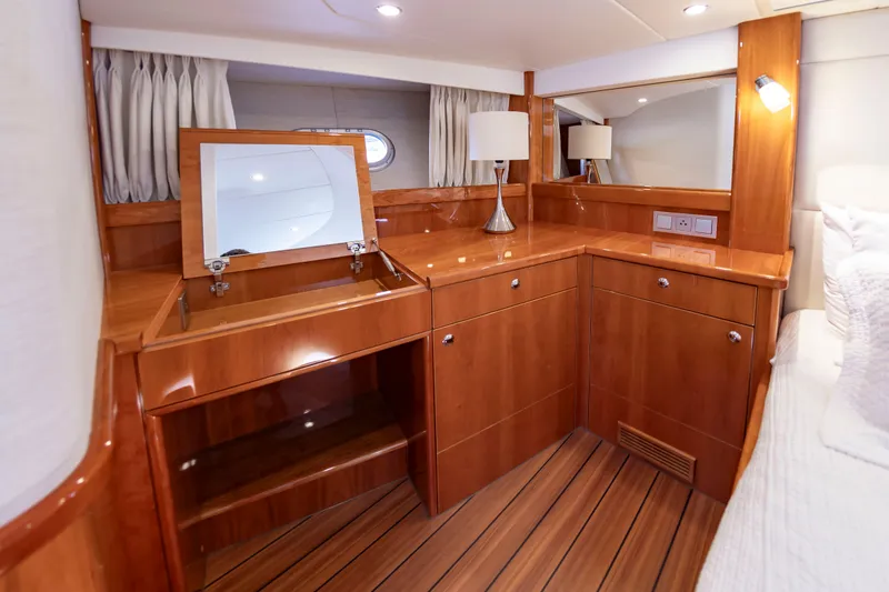 Slide: The Image of Luxurious interior of an Elling E6 yacht with wood paneling and elegant lighting. - 48