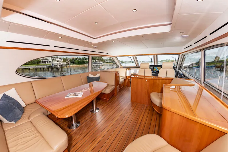 Slide: The Image of Interior of a luxurious Elling E6 yacht with wooden floors and panoramic windows. - 16