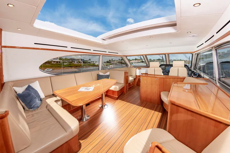 Slide: The Image of Interior of a luxury yacht with wooden floors and large windows. - 15