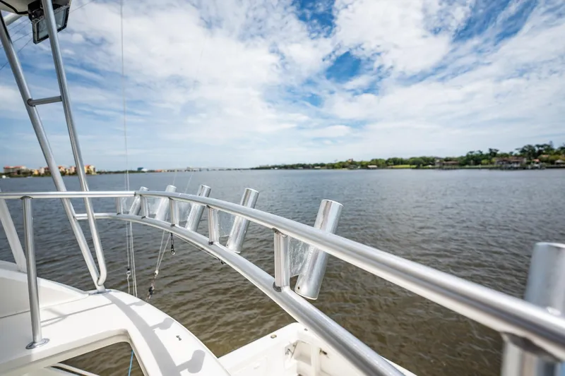 Slide: The Image of Ocean Yachts 43 Super Sport 2000, view from deck overlooking serene water and sky. - 10
