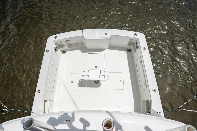Slide: The Image of 2000 Ocean Yachts 43 Super Sport boat deck, aerial view over water. - 11