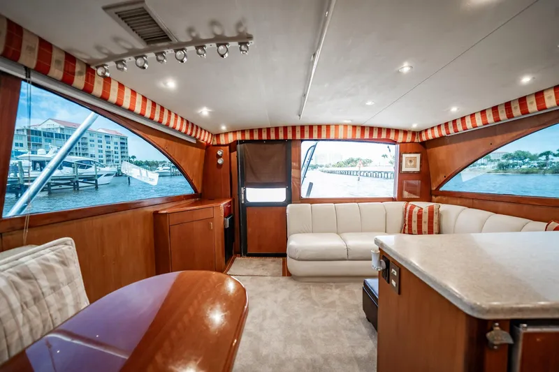 Slide: The Image of Luxurious interior of 2000 Ocean Yachts 43 Super Sport with elegant seating and waterfront view. - 20