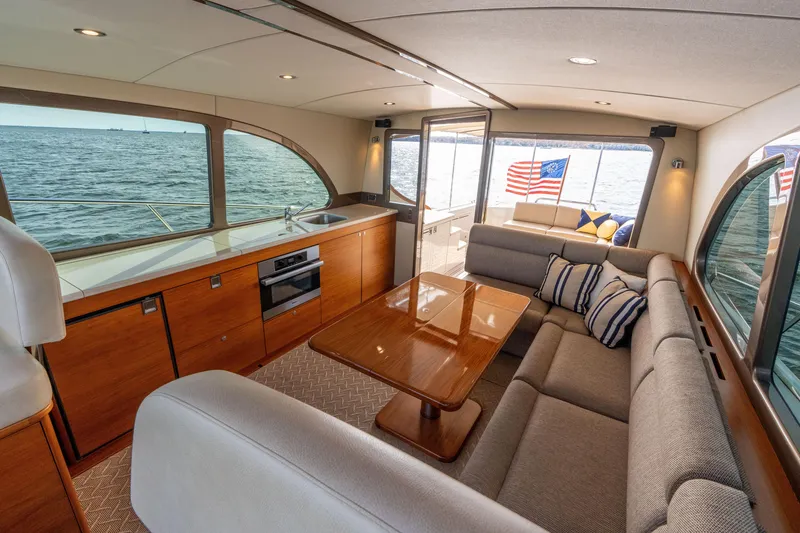 Slide: The Image of Luxurious interior of 2016 Palm Beach Motor Yachts PB50 with ocean view and elegant furnishings. - 45