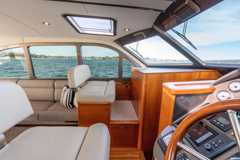 Slide: The Image of Luxurious interior of 2016 Palm Beach Motor Yachts PB50 with elegant wood and leather finishes. - 46