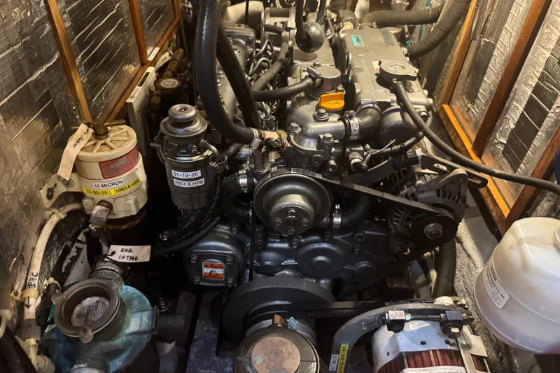 Slide: The Image of Engine compartment of a 2007 Hylas H49 yacht, showcasing detailed mechanical components. - 46
