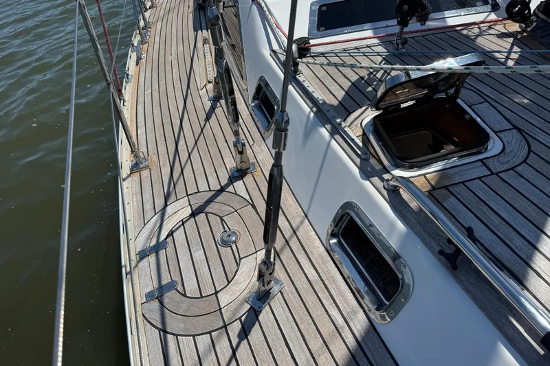 Slide: The Image of Deck of 2007 Hylas H49 yacht with open hatch and wooden finish. - 61