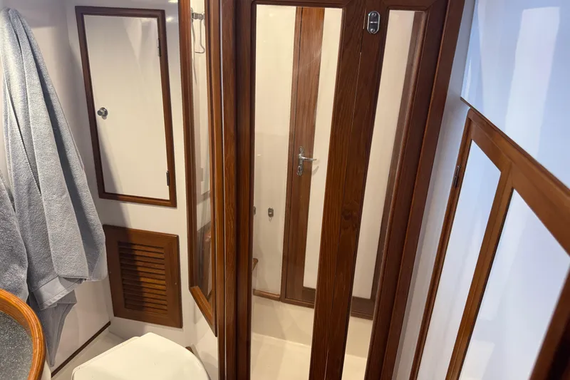 Slide: The Image of Luxurious bathroom interior of 2007 Hylas H49 yacht with wooden accents and shower. - 43