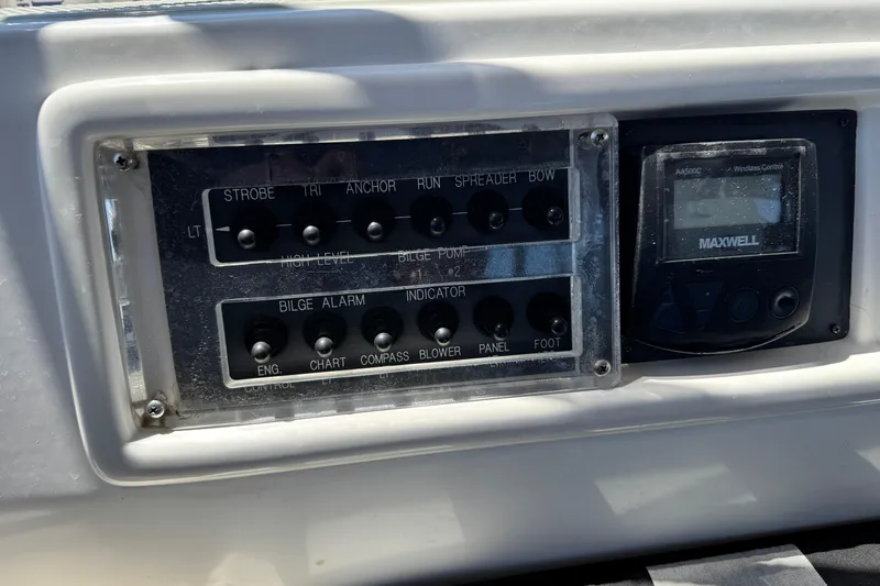 Slide: The Image of Control panel on a 2007 Hylas H49 yacht with switches and Maxwell windlass control. - 74