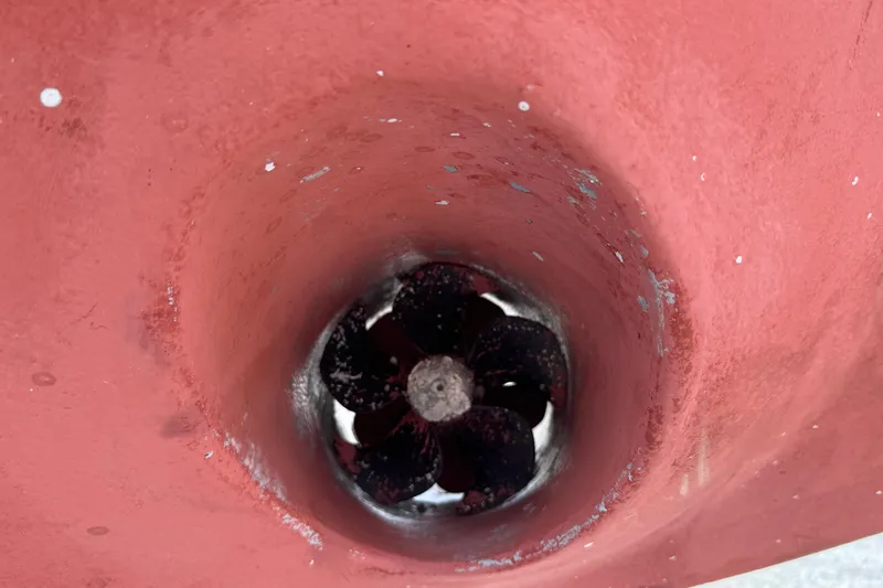 Slide: The Image of Close-up of a 2007 Hylas H49 boat propeller in a red tunnel. - 58