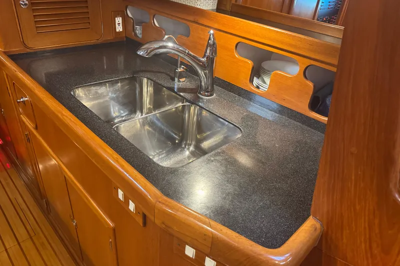 Slide: The Image of Luxurious wooden yacht kitchen with double sink, Hylas H49, 2007 model. - 35
