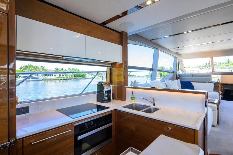 Slide: The Image of Luxurious interior of 2020 Princess F70 yacht with modern kitchen and scenic water view. - 3