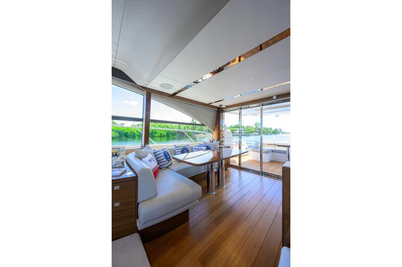 Slide: The Image of Luxurious interior of 2020 Princess F70 yacht with elegant seating and scenic views. - 34