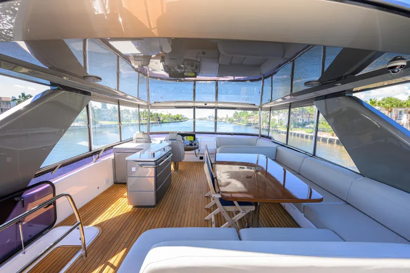 Slide: The Image of Luxurious interior of 2020 Princess F70 yacht with elegant seating and scenic views. - 50