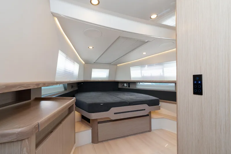 Slide: The Image of 2022 Fjord 44 Open cabin interior with modern design and ambient lighting. - 36