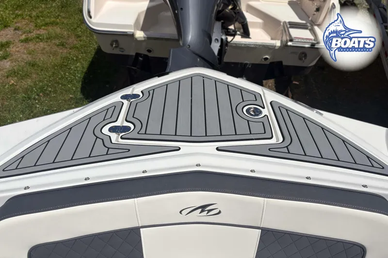Slide: The Image of Monterey M-65 boat deck, 2020 model, featuring sleek gray and white design with logo. - 3
