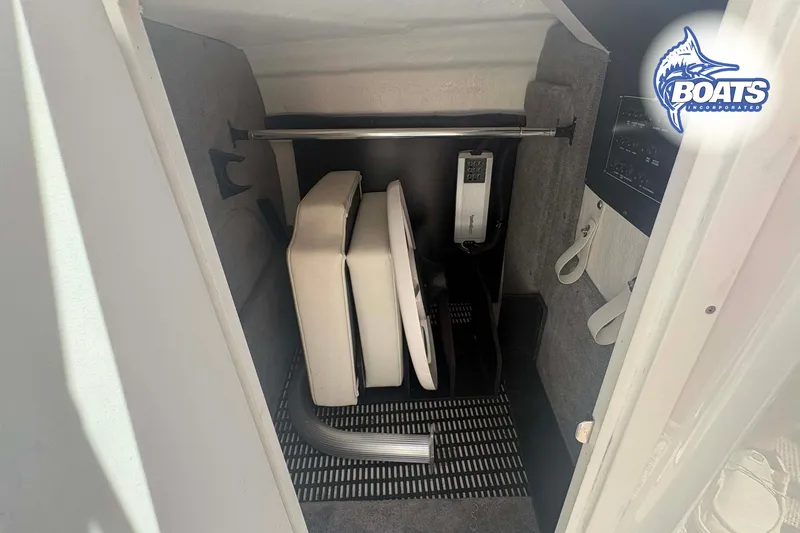 Slide: The Image of Storage compartment in a 2020 Monterey M-65 boat with cushions and equipment. - 6