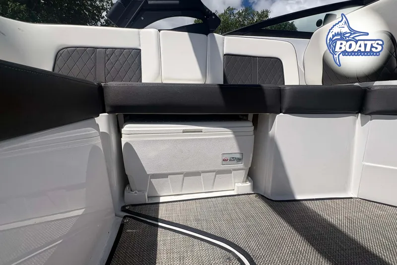 Slide: The Image of Interior of 2020 Monterey M-65 boat with seating and storage compartment. - 13