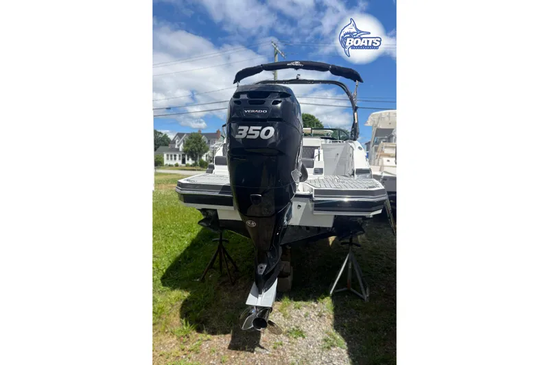 Slide: The Image of 2020 Monterey M-65 boat with a powerful Verado 350 engine, displayed outdoors. - 18
