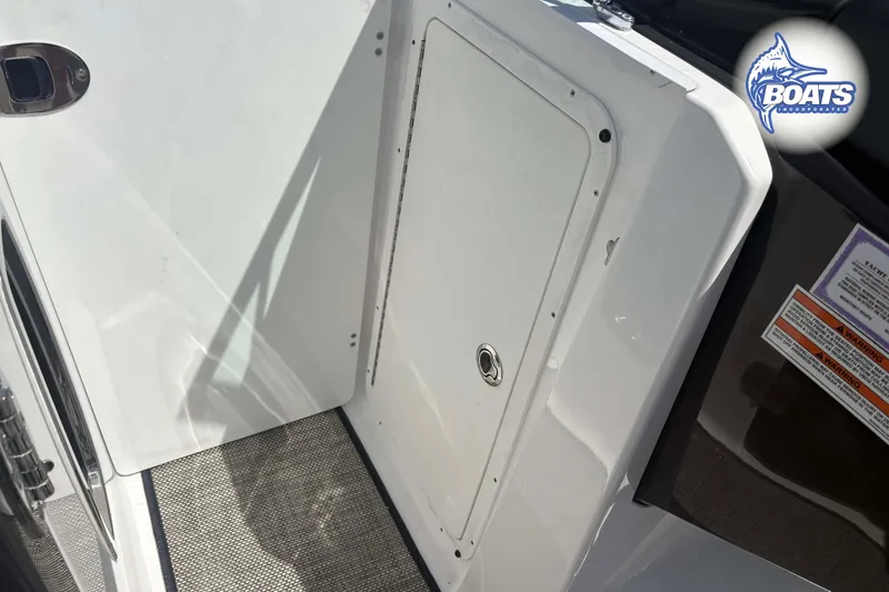 Slide: The Image of White Monterey M-65 boat interior with storage compartment, 2020 model. - 5