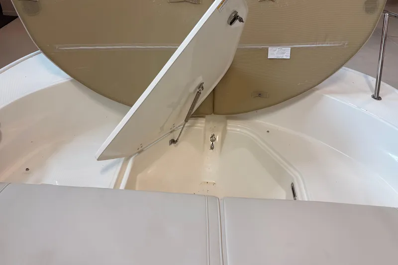 Slide: The Image of Open storage compartment on 2026 Boston Whaler 210 Montauk boat. - 10