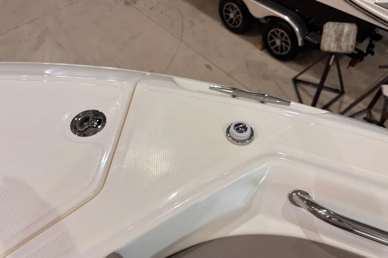 Slide: The Image of Bow area of a 2026 Boston Whaler 330 Vantage boat, featuring sleek design elements. - 25