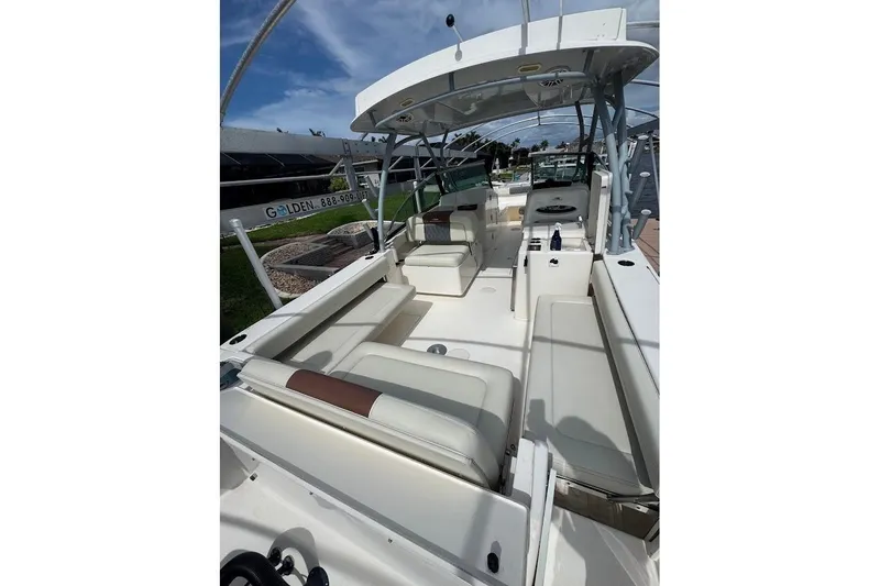 Slide: The Image of 2020 Cobia 280 Dual Console boat interior with spacious seating and modern design. - 24