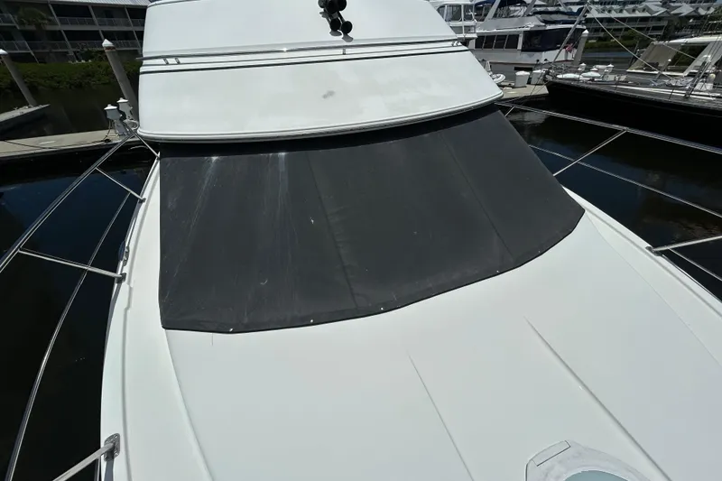Slide: The Image of 2005 Carver 36 Motor Yacht docked at marina. - 10