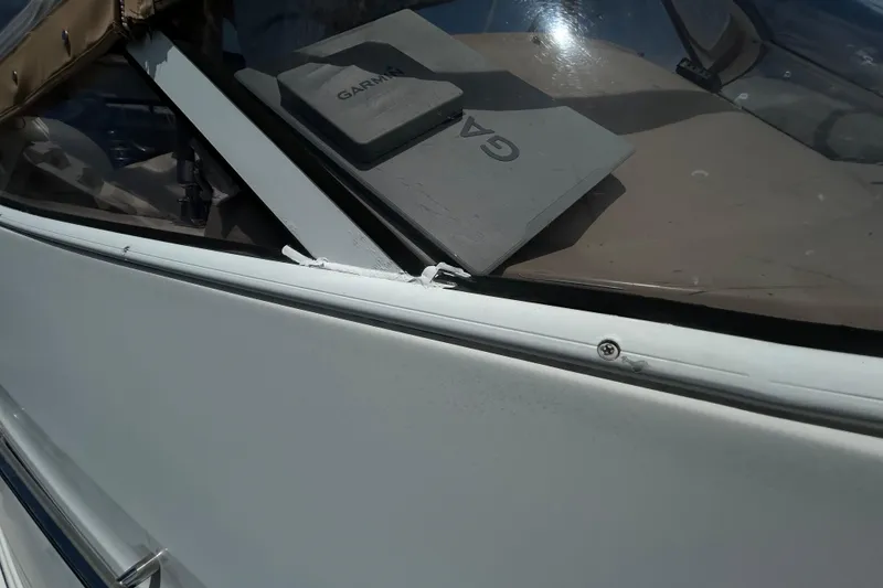 Slide: The Image of 2005 Carver 36 Motor Yacht windshield with Garmin device visible. - 11