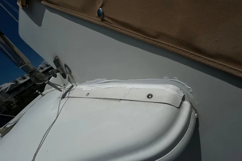 Slide: The Image of Close-up of 2005 Carver 36 Motor Yacht deck with sealant and hardware. - 12