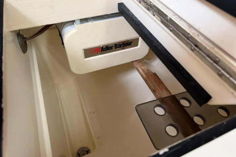 Slide: The Image of Adler Barbour refrigeration unit in 1989 Sabre 34 MK II sailboat interior. - 28