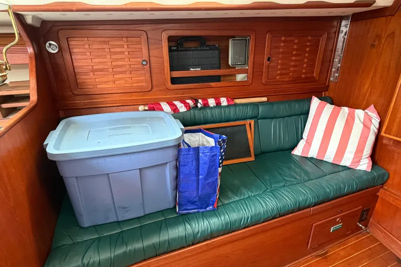 Slide: The Image of Interior of 1989 Sabre 34 MK II sailboat with storage and seating area. - 7