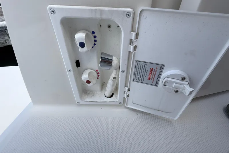 Slide: The Image of Control panel on a 2011 Monterey 320 Sport Yacht with temperature knobs. - 13
